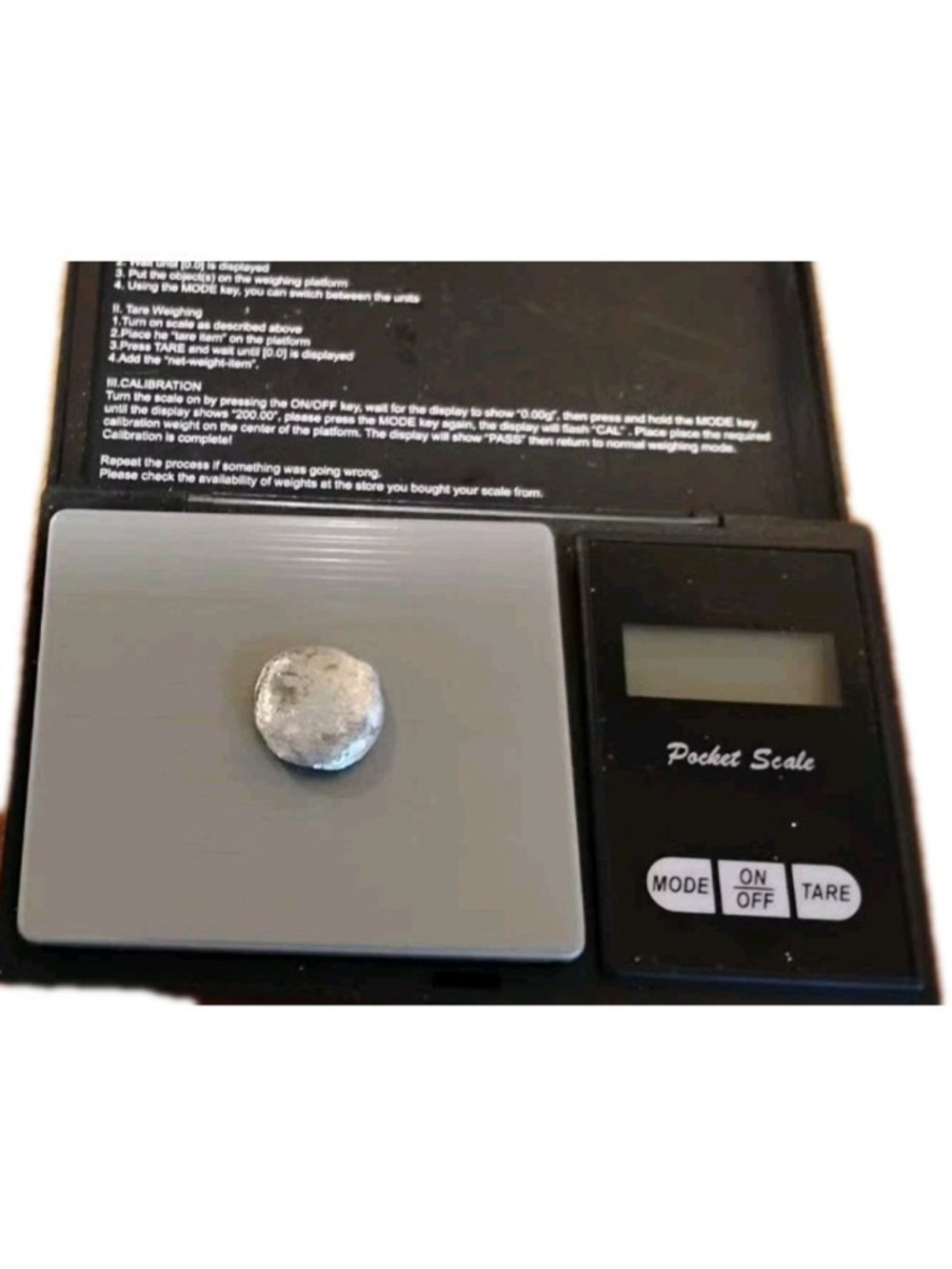 Scrap silver from melted Sterling Silver jewellery. Approx 8.3 grams.